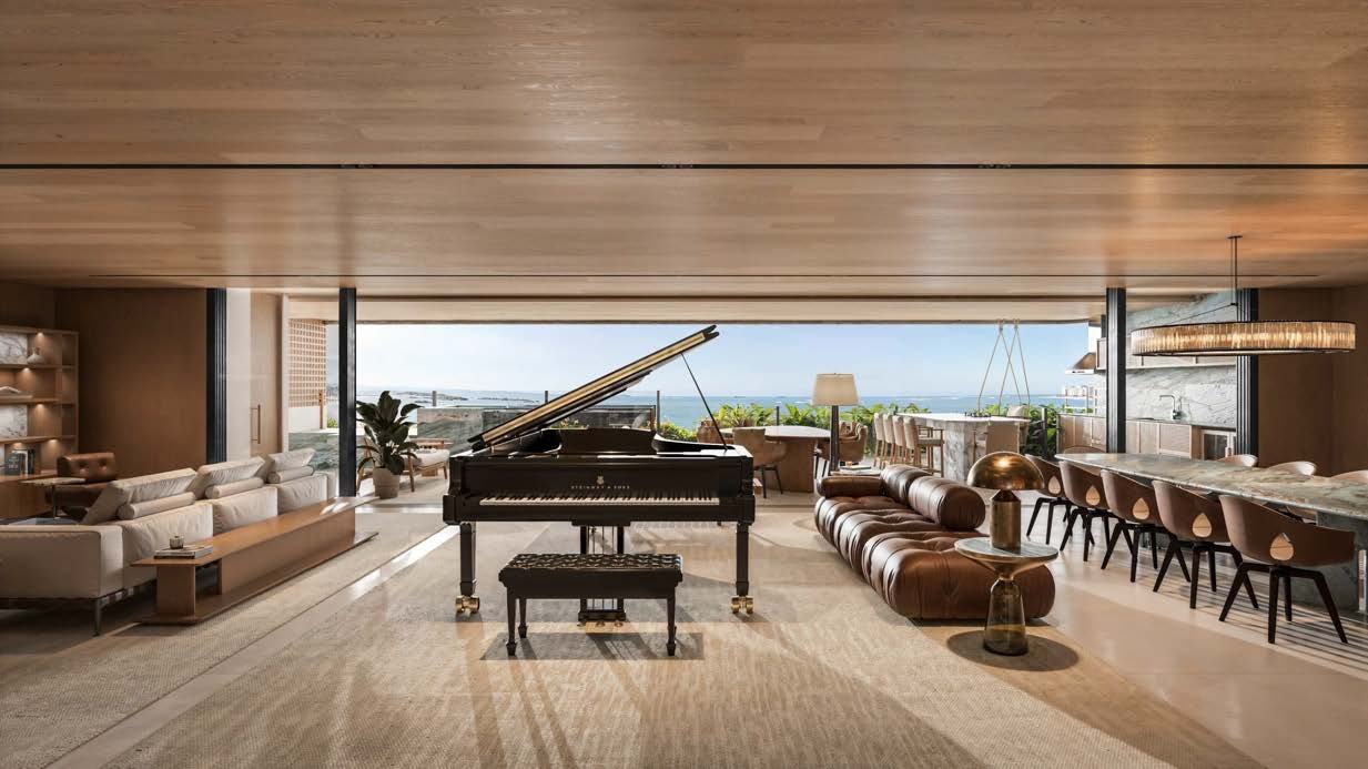 Living amplo com envidraçamento panorâmico e vista eterna para o mar no Seven Mansões Suspensas